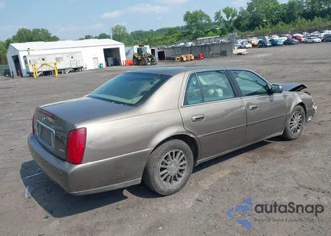2003 Cadillac Deville Dhs z USA, uszkodzony, nr VIN 1G6KE54Y23U281967